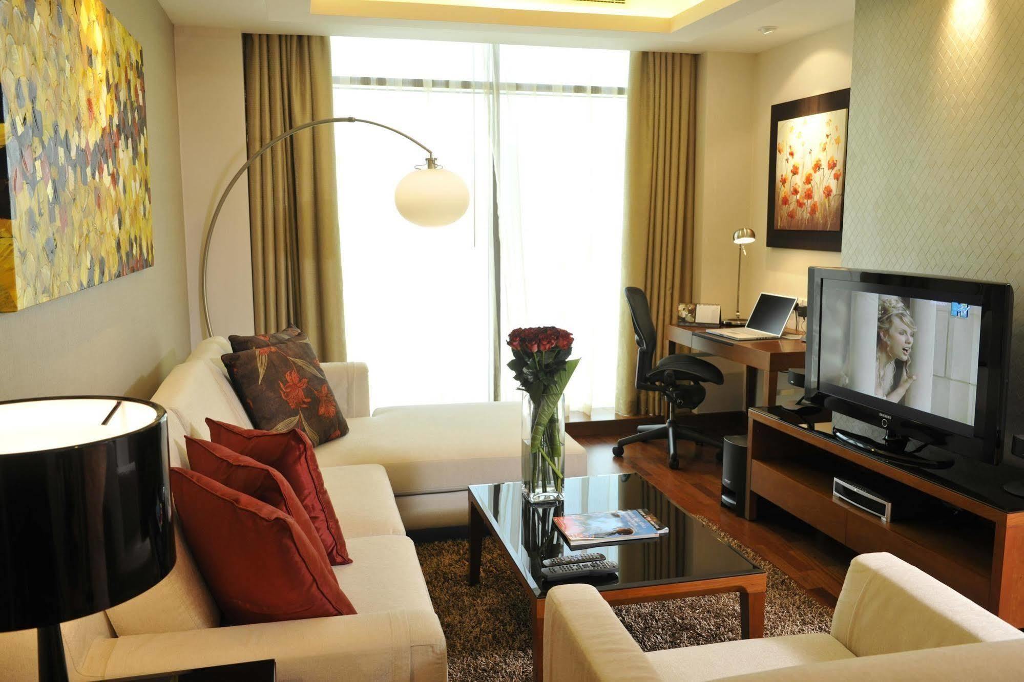 Fraser Suites Seef Bahrain Μανάμα Δωμάτιο φωτογραφία A living room in a serviced apartment in Kuala Lumpur, Malaysia